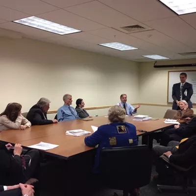 Image: At Raucous Caucus, Dems Revisit Ban on Corporate Contributions to Candidates