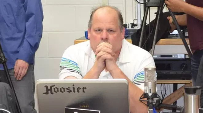 Image: David Kirk Dominates School Board Discussion, Even in Absentia