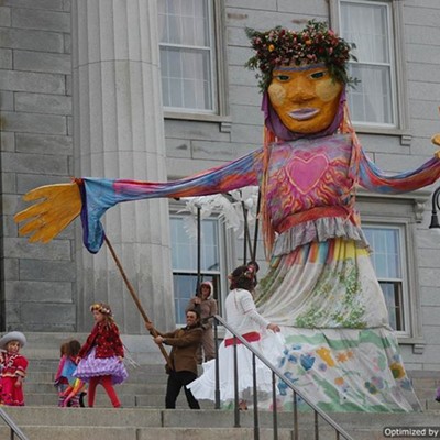 Earth Goddess emerges at the Statehouse as part of All Species Day.