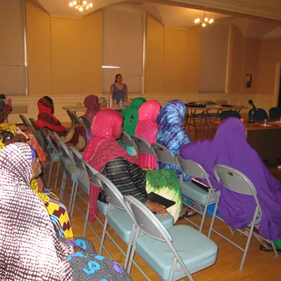 Image: Parent University Students Attend Class at City Hall