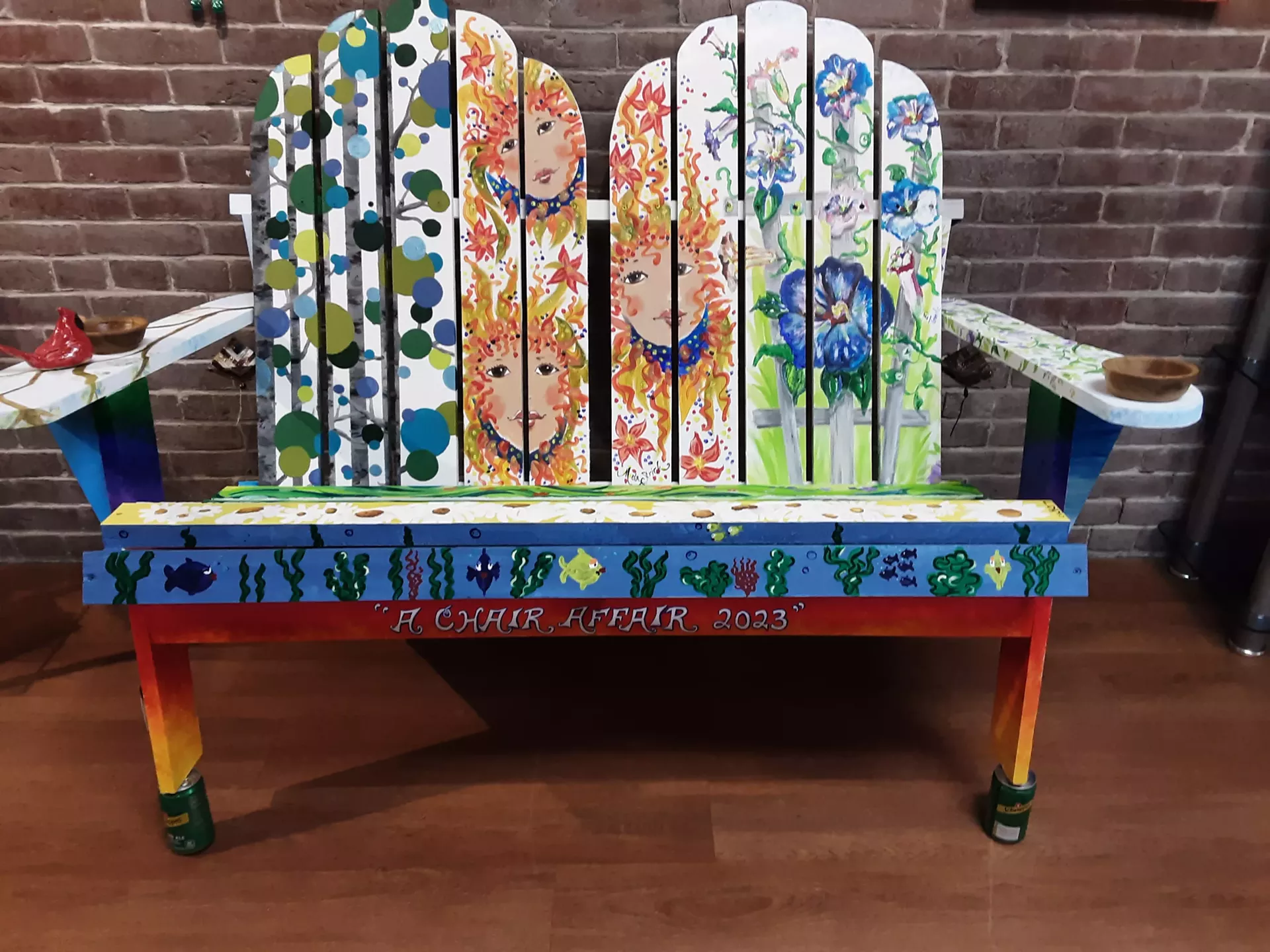 Adirondack chair decorated by Arleigh Young