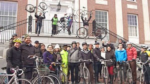 A group of cyclists in front of Burlington City Hall before a ride celebrating Budnitz Bicycles and Modern Mobility Movement Day