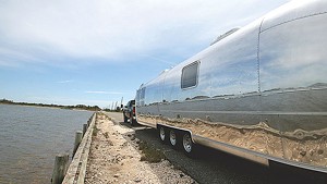 At 34 feet long, this airstream, completed in May, is used as a guest house for visiting family and features solid red oak furnishings