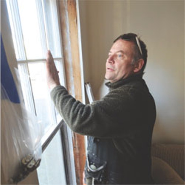 Chris Pratt of Open Sash installs retrofitted energy-efficient windows in a Montpelier home - JEB WALLACE-BRODEUR