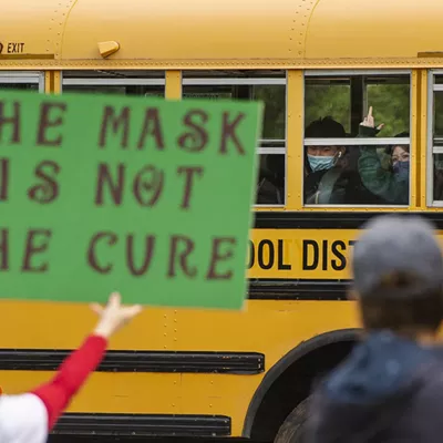 Image: Photo of CVU Student Flipping Off Anti-Mask Protesters Goes Viral