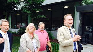 From left, Allen Gilbert, director of the Vermont chapter of the ACLU; Rhonda Taylor, her husband, Ken Taylor and attorney Robert Appel announce outside U.S. District Court in Burlington the filing of a  wrongful death lawsuit against the Vermont State Police for the 2012 death of Rhonda Taylor's son, MacAdam Mason.