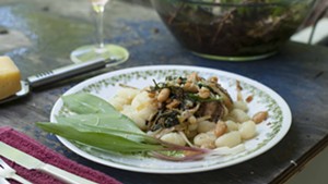 Gnocchi with ramps, sausage, beans and wild greens. What could be better for a springy meal al fresco?