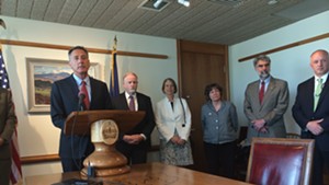 Gov. Peter Shumlin, with DCF Commissioner Dave Yacovone at his left, announces a series of reforms to the agency in response to two recent child deaths.