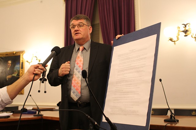 Rep. Don Turner displays the Republican caucus' priorities Thursday at the Statehouse. - PAUL HEINTZ