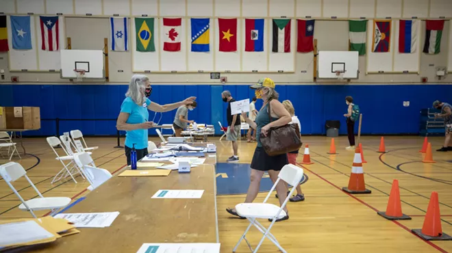 Image: In-Person Voting Is Light, But Turnout High for Pandemic Primary