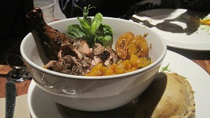 Jerk chicken bowl with Jamaican pork patty