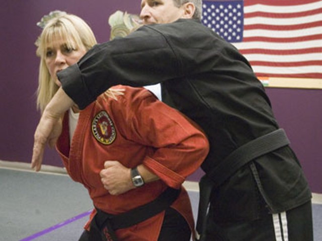 Laurie Shover with her "attacker" Rick Massar - MATTHEW THORSEN