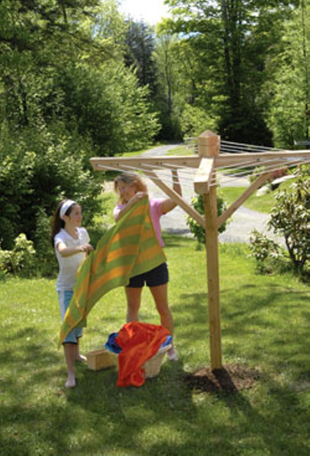 Michelle Baker and helper with a &#8220;Garden Party&#8221; clothesline