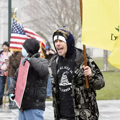 Image: A Small Lockdown Protest Features Sweeping Conspiracy Theories