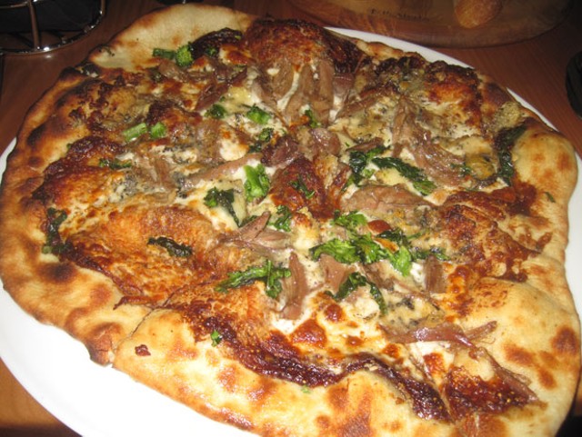 Pizza with house duck confit, broccoli rabe, figs and Boucher blue cheese at nika