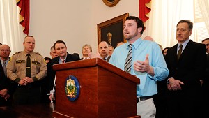 Recovering opiate addict Dustin Machia speaks at a Statehouse press conference last week