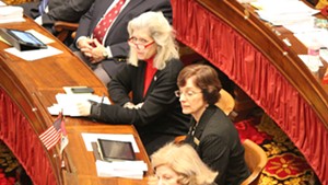 Rep. Vicki Strong listens as the House debates an abortion resolution.