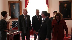 Senators escort Gov. Peter Shumlin (center) from his ceremonial office to the Senate chamber.