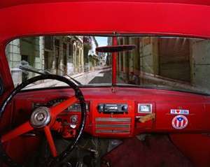 COURTESY OF BIGTOWN GALLERY - "Sol and Cuba, Old Havana, looking north from Albert Rojas' 1951 Plymouth" by Alex Harris