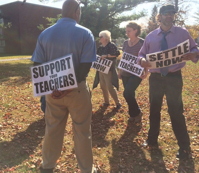 Teachers picket outside South Burlington High School Tuesday. - MARK DAVIS