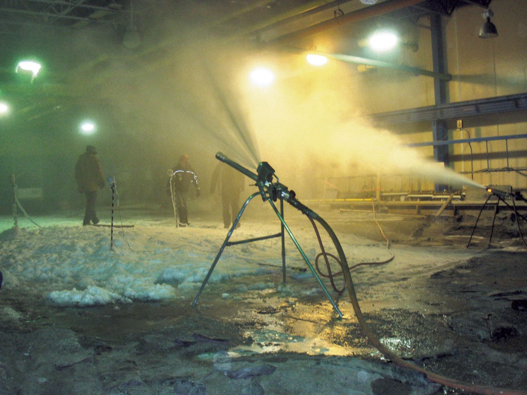 Testing snow guns at the Cold Regions Research and Engineering Laboratory - COURTESY OF CRREL