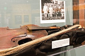 The inner chamber of the 1861 fiddle, on loan   from the barber at the university&#8217;s barber shop,  is inscribed with Abraham Lincoln&#8217;s name.