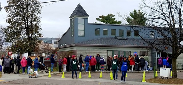 Waiting in line for turkeys at the Chittenden Emergency Food Shelf - ANNA MCMAHON/FOOD SHELF