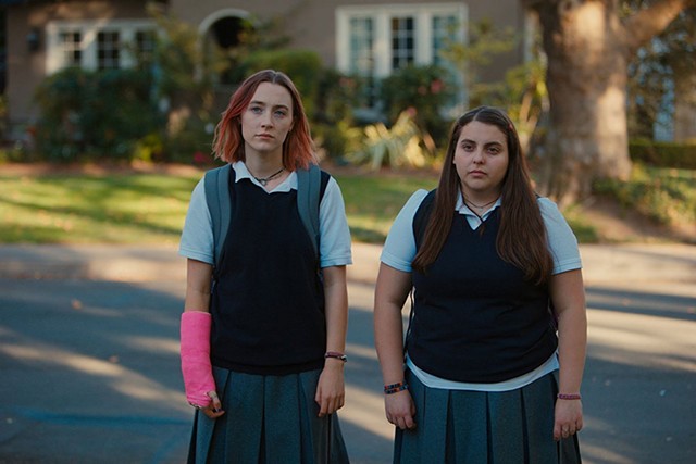 SKIRTING TROUBLE Ronan and Feldstein play Catholic schoolgirls with a creative wild side in Gerwig's solo directorial debut.