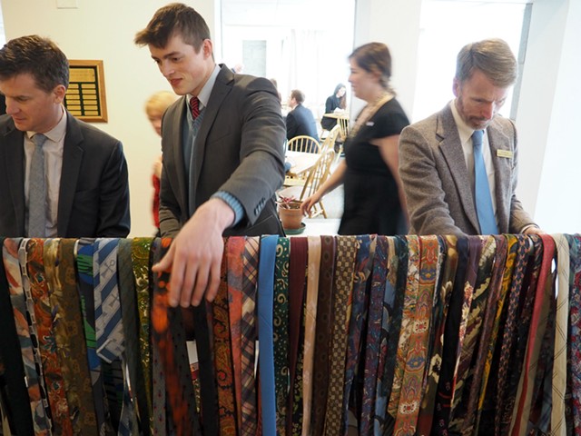 Lobbyists and lawmakers peruse Rep. Dave Sharpe's tie collection - TAYLOR DOBBS