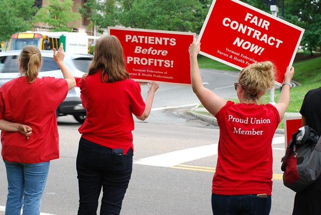 Nurses at a honk-and-wave rally outside the hospital - SARA TABIN