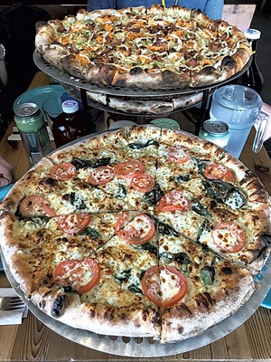 Folino's pizza - SALLY POLLAK