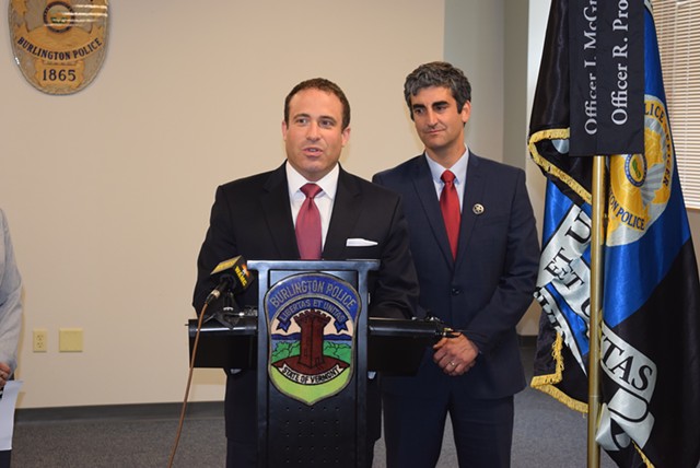 Brandon del Pozo (left), newly appointed as Burlington's  next police chief, speaks Tuesday after being introduced at a press conference by Mayor Miro Weinberger (right). - TERRI HALLENBECK
