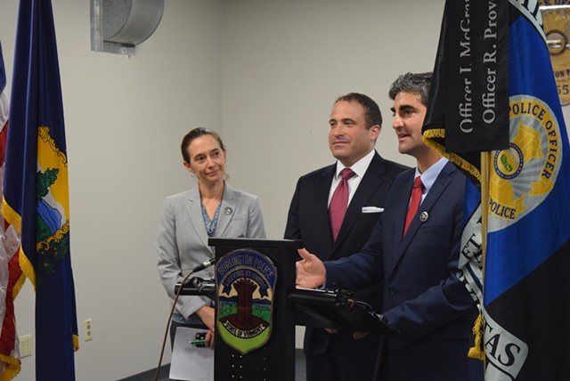 Brandon del Pozo (center) appears Tuesday at a Burlington news conference, with Mayor Miro Weinberger and Police Commission chair Sarah Kenney. - TERRI HALLENBECK