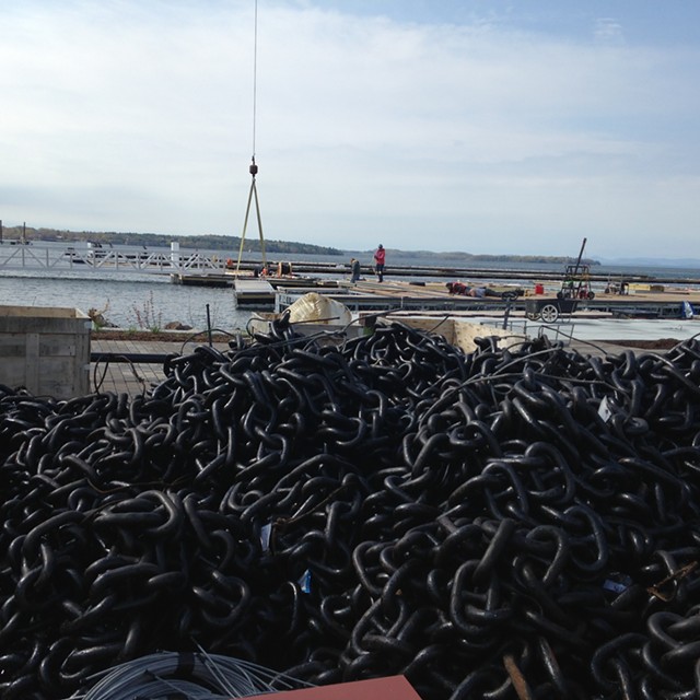 A pile of chains that will help secure the floating breakwater at the Burlington Harbor Marina - MOLLY WALSH