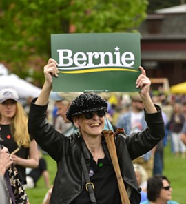 Susan Clark, 64, of West Barnet, holding a Bernie Sanders sign - STEFAN HARD