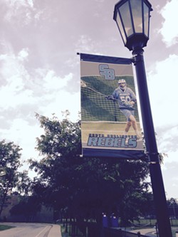 A banner on the campus of South Burlington High School, home of the Rebels - MOLLY WALSH/SEVEN DAYS