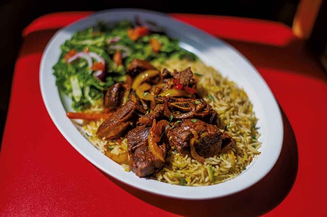 A classic Somali dish of goat and rice at Kismayo Kitchen - GLENN RUSSELL