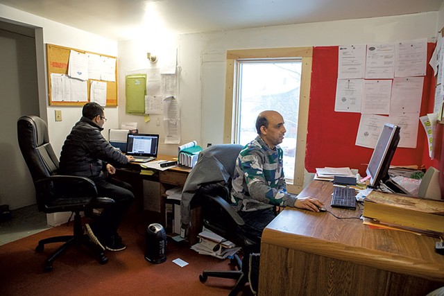 Bhuwan Sharma (left) and Chandra Pokhrel at their office - LUKE AWTRY