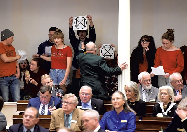 Extinction Rebellion activists during Gov. Phil Scott's State of the State address Montpelier - FILE: JEB WALLACE-BRODEUR