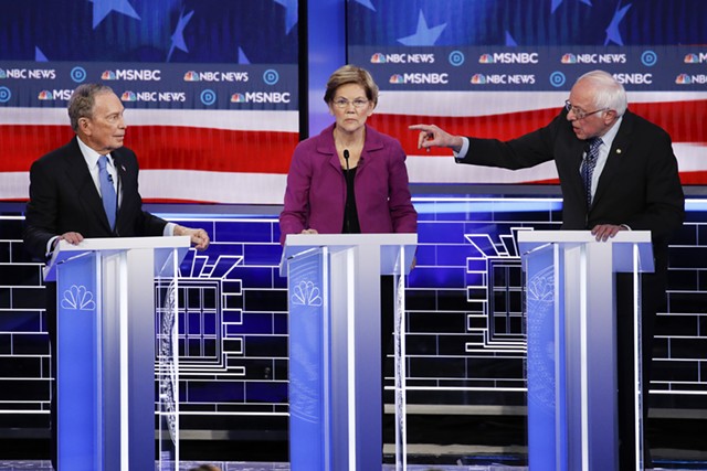 Former mayor Michael Bloomberg, Sen. Elizabeth Warren and Sen. Bernie Sanders debating Wednesday in Las Vegas - ASSOCIATED PRESS