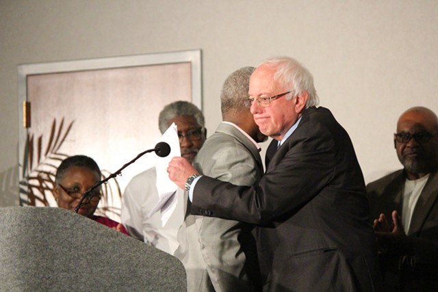 State Representative Terry Alexander embraces Sen. Bernie Sanders Saturday in Columbia - PAUL HEINTZ