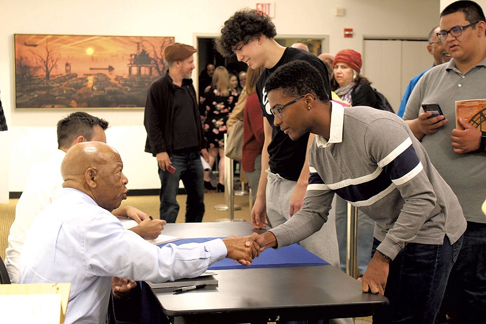 John Lewis signing books at the Flynn on October 7, 2019 - COURTESY OF VERMONT HUMANITIES