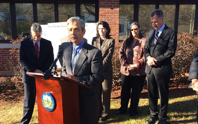 Robert Sand, Gov. Peter Shumlin's liaison to Criminal Justice Programs, speaks at a press conference outside the Chittenden Regional Correctional Facility in South Burlington, with Shumlin in the background.