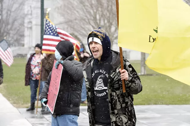 A Small Lockdown Protest Features Sweeping Conspiracy Theories