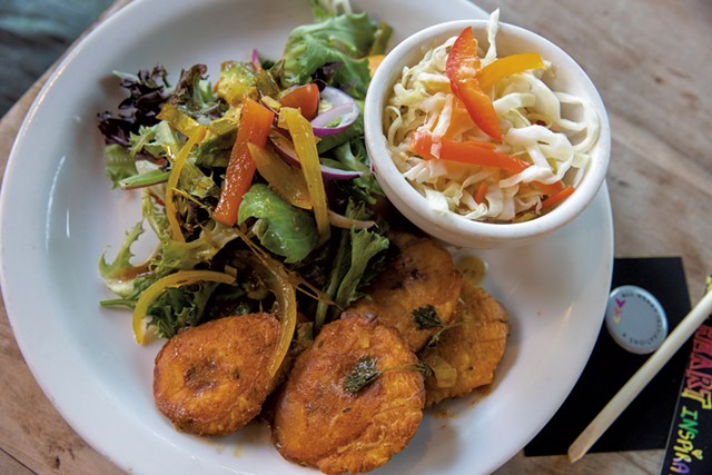 Bannan peze ak Fifi's Pikliz: fried green bananas with a spicy, pickled cabbage slaw - JAMES BUCK