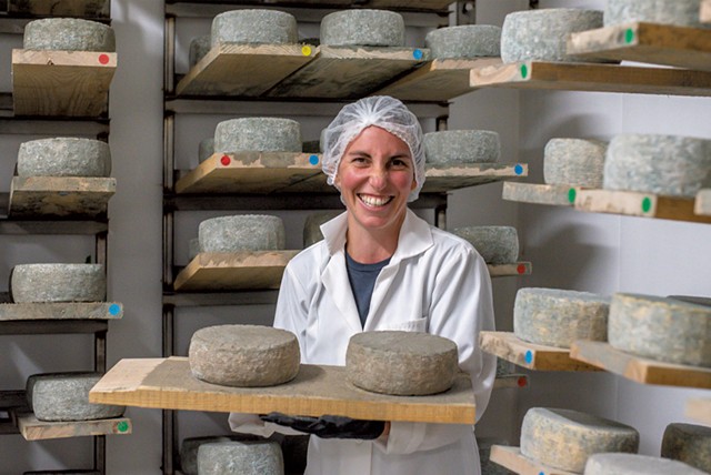 Melanie Webb with some of the raw-milk cheese she makes at Stony Pond Farm - GLENN RUSSELL