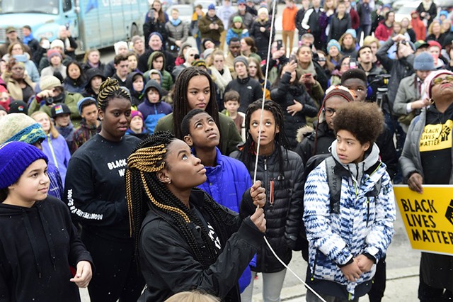 Joelyn Mensah raising the Black Lives Matter flag at Montpelier High School - FILE: JEB WALLACE-BRODEUR