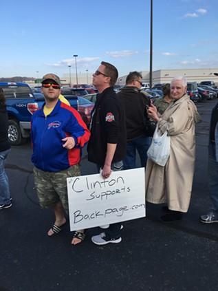 Trump fans wait in line Monday for a rally in Vienna, Ohio. - PAUL HEINTZ