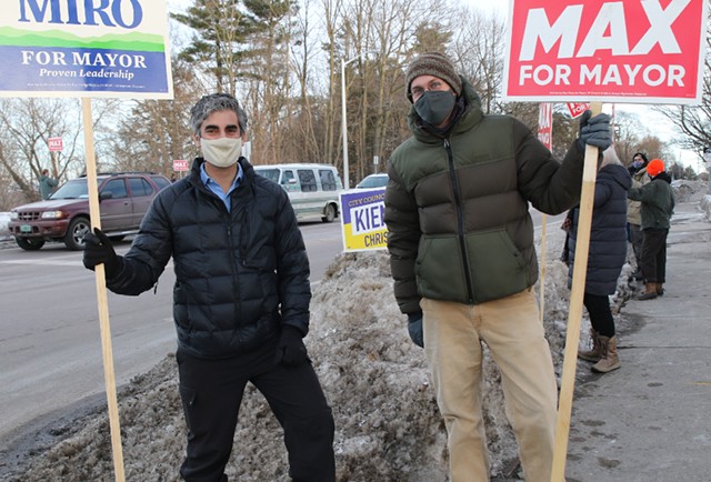 Candidates Miro Weinberger (left) and Max Tracy at a honk-and-wave Friday evening - COURTNEY LAMDIN ©️ SEVEN DAYS
