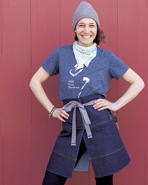 Rachel Stern modeling a KWBB gardening apron - HOMER HOROWITZ